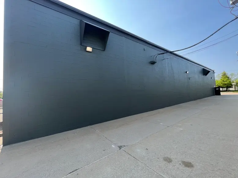 Completed exterior painting of a commercial property